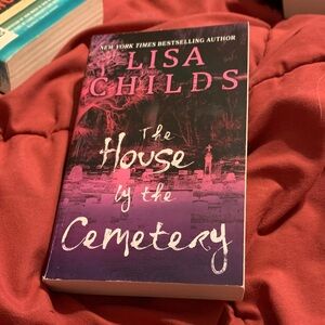 The House by the Cemetery Paperback - Purple